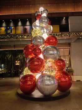 A unique ornament in the front yard of a shopping center photo