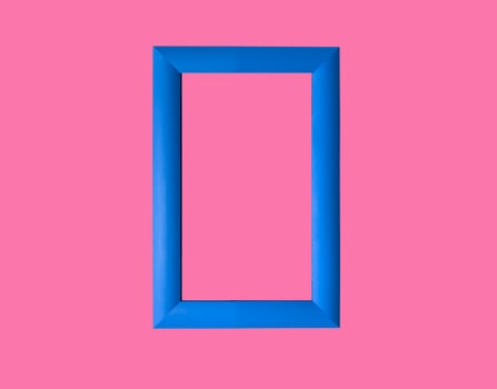 Modern rectangular picture frame, wall art in pop style. Blue border on pink background. Stylish and photo