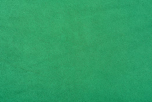 Green suede background macro photo. Green suede leather. photo