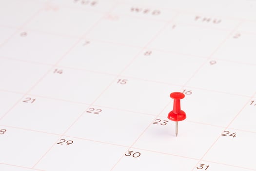Important date calendar with red pin photo