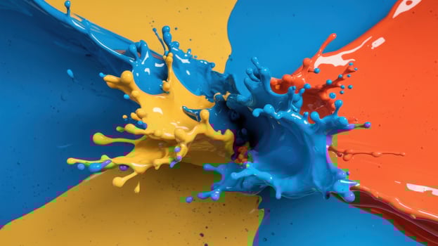Colorful paint splashes on a blue and yellow background photo