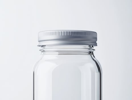 clear glass jar with silver metal lid, showcasing food safety features and modern design photo