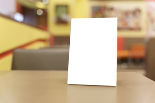 blank menu on table in restaurant photo