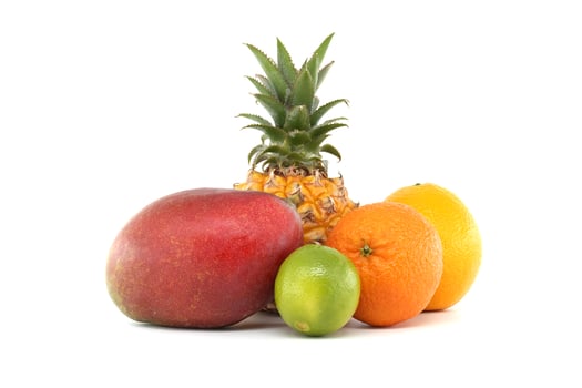 Fresh Tropical Fruits Including Mango, Lime, and Pineapple photo