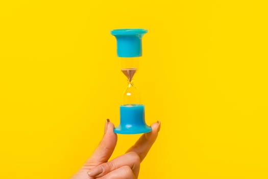 hourglass in hand photo