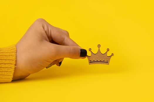 wooden crown in hand photo