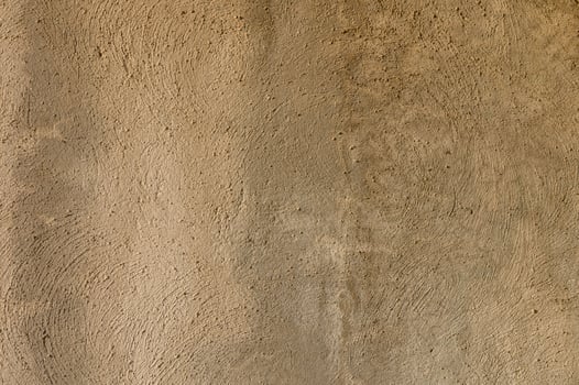 Textured earth surface showcasing natural tones and subtle variations in a rustic environment photo