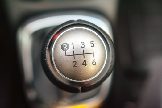Close up of a six speed manual gear shift knob in a vehicle photo