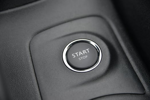 Close up of a car's start stop button Modern vehicle interior detail photo