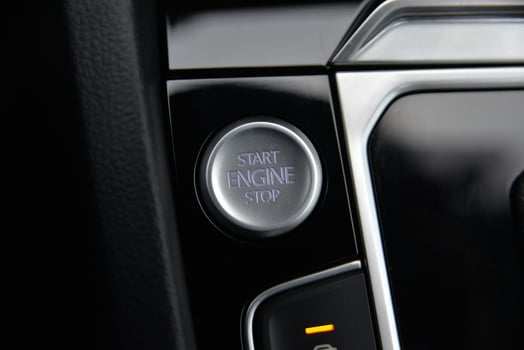 Close up of a car's start engine stop button photo