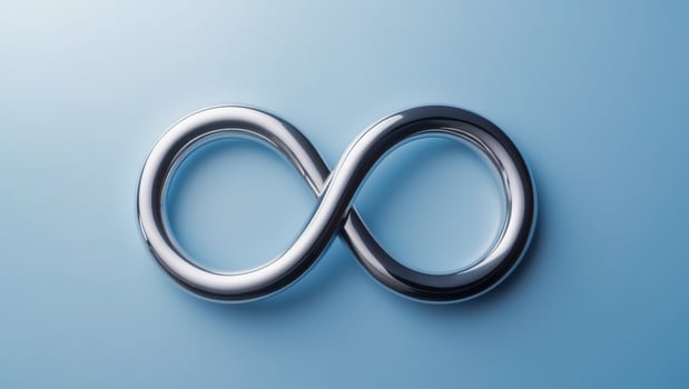 metallic infinity symbol on blue backgroundmetallic infinity symbol on blue background. photo