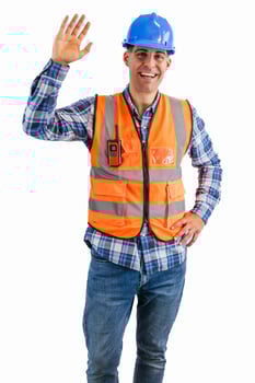vertical Construction worker smiling and waving at the camera wearing orange vest and safety helmet photo