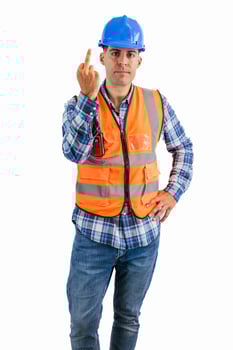 vertical Angry construction worker making an obscene gesture at the camera photo