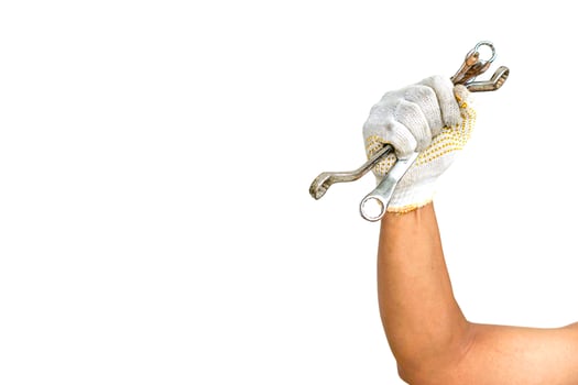 a man holding a wrench in his hand photo