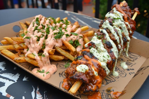 A tray with a burger and fries on it photo