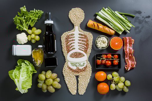 A person's skeleton is surrounded by food and vegetables photo