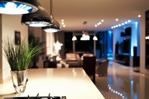 A kitchen with a stove and a table photo