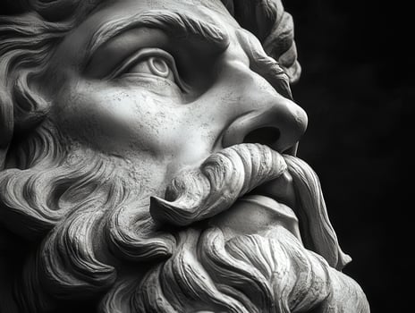 Detailed close-up of a classical sculpture depicting a noble figure's face photo