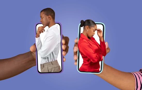 Two individuals African American couple is engaged in a distant conversation via smartphones, expressing their emotions. photo