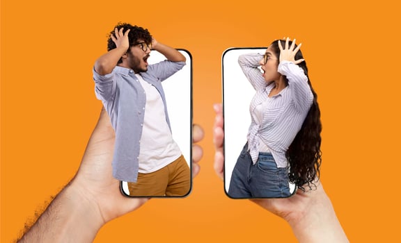 A married couple appears surprised while communicating through their smartphones. Each person displays a dramatic expression, highlighting their connection despite the digital barrier. photo