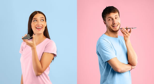 Communication Concept. Couple talking on phone holding gadget near mouth, posing on studio wall photo