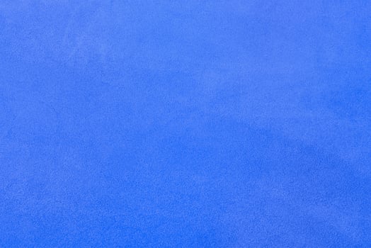 Blue suede macro photo as background