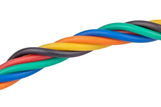 Bright twisted insulated wires close up photo
