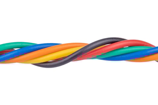 Twisted multicolored insulated wires close up photo