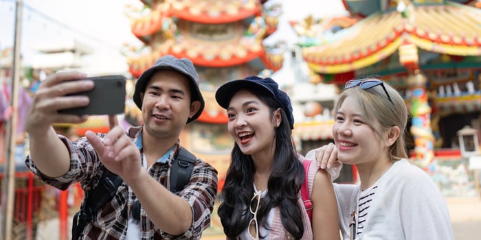Friendship travel moments capturing joyful experiences at a cultural landmark vibrant environment group perspective photo