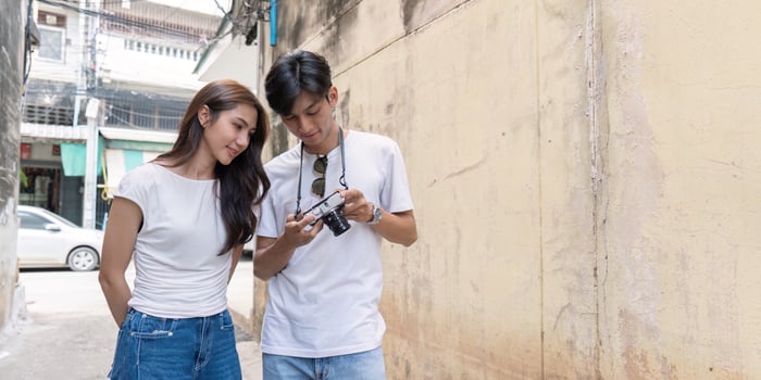 Traveling couple hidden streets urban environment lifestyle intimate moment photo