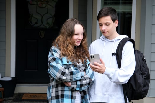 Photo of family young teenagers boyfriend girlfriend use phone look above head amazed social medias info isolated on cyan color background