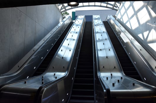 Trio of Rising Escalators at a Subway Station photo