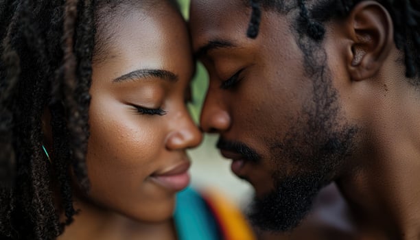 Close up of couple foreheads touching, eyes closed, conveying deep emotional connection and intimacy. photo