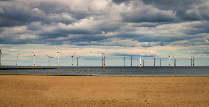 Offshore Wind Turbine in a Windfarm under construction off the England Coast. photo