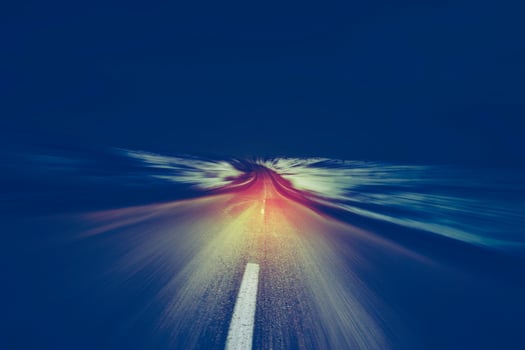 asphalt road and dramatic sunset over it. photo