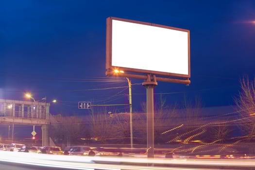 Billboard in the street at night photo