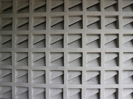 a wall with a pattern of squares on it photo