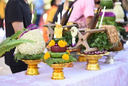 A table with a variety of food and flowers photo