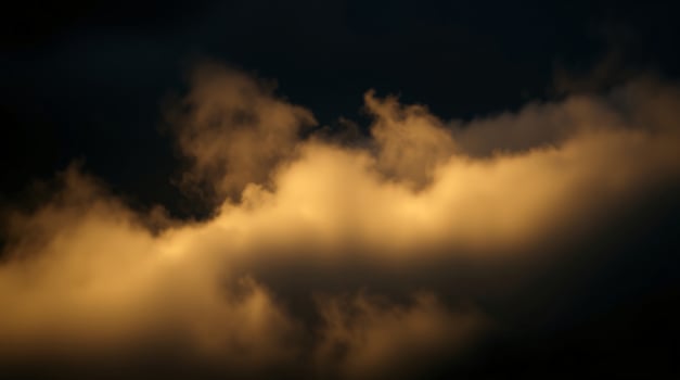 A photo of a dark sky with clouds