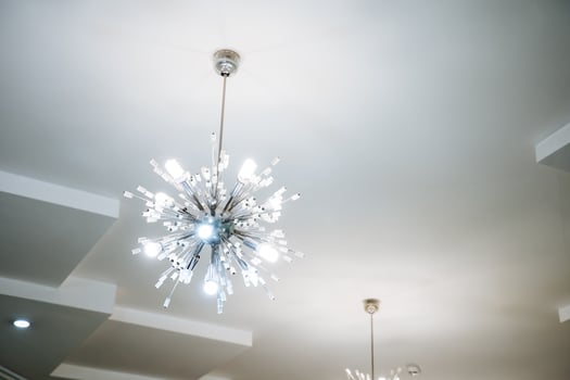 An Elegant and Modern Chandelier featuring a Radiant Light Fixture designed beautifully to enhance the appeal of any Contemporary Interior Space with its stunning design photo