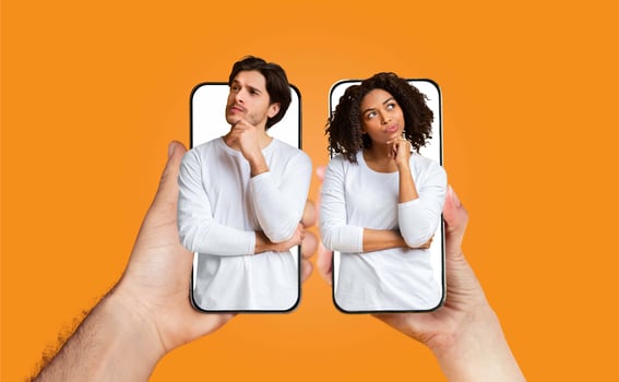 A couple shares moments of affection by chatting online using their smartphones. They showcase love and connection while engaging with technology. photo
