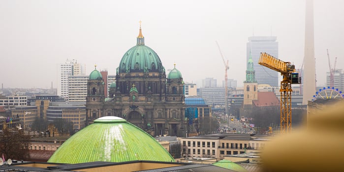 Berlin skyline with historic and modern sights. Panoramic birds eye view of foggy Berlin from the rooftop of French Church. Historic and modern landmarks on a misty day. Copy space 8 photo