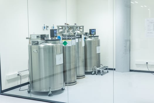 Cryogenic tanks containing liquid nitrogen in modern scientific laboratory photo