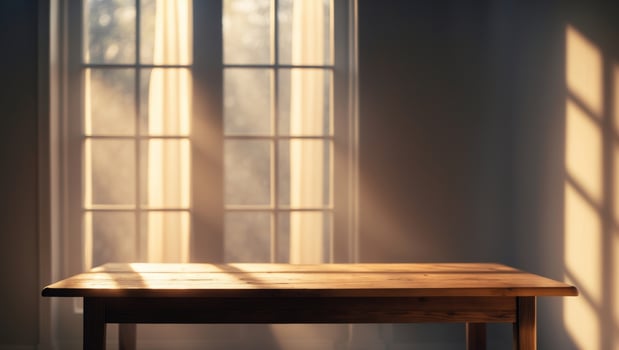 An empty table in front of a window photo
