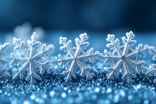 Intricate Frozen Snowflakes on Sparkling Blue Background for Winter Decor Design photo