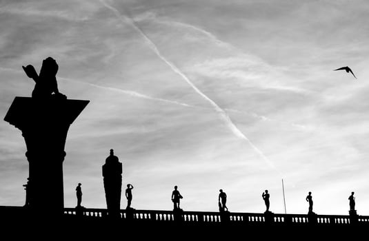 Piazza San Marco in Venice, Italy. Silhouetted line of statues photo