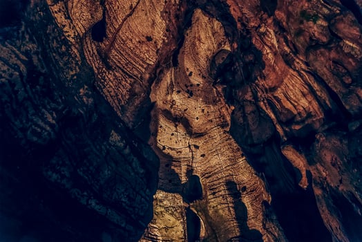 Red journey underground cave, corridor ceiling in hole of mountain photo