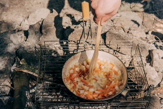 Camping Kitchen, Travelers Camp Cooking Food in Pots on Campfire journey photo