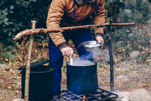 Camping Kitchen, Travelers Camp Cooking journey Food in Pots on Campfire photo