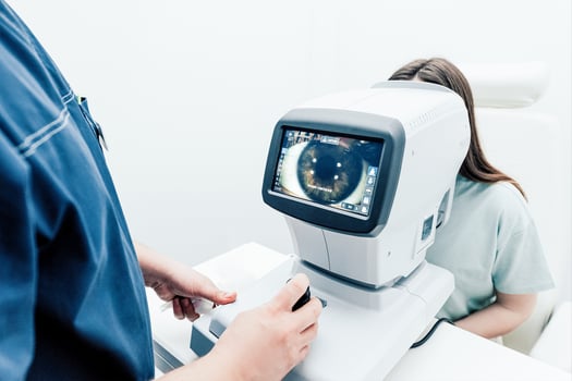 Patient checkup nice ophthalmologist, medical equipment checking vision, close up eye photo